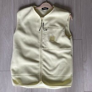 Rains butter yellow fleece vest, size small